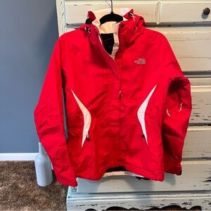 The North Face Vibrant Red HyVent Jacket with White Accents. Women’s size medium